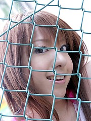 Japanese cutie models her tight ass in her shorts - Erotic and nude pussy pics at GirlSoftcore.com