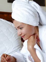 Berenice poses on the bed baring her slender body and sweet pussy. - Erotic and nude pussy pics at GirlSoftcore.com