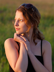 Nikia A flaunts her amazing, nubile body as she poses on the couch. - Erotic and nude pussy pics at GirlSoftcore.com