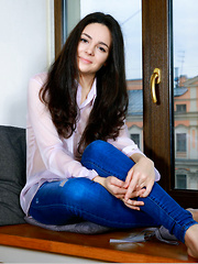 Bridgette Angel strips by the window baring her sexy body with delectable tits. - Erotic and nude pussy pics at GirlSoftcore.com