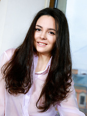 Bridgette Angel strips by the window baring her sexy body with delectable tits. - Erotic and nude pussy pics at GirlSoftcore.com