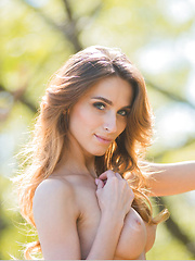 Cara Mell shows off her long and lean physique, slender limbs, and smooth assets as she poses in a wooden swing - Erotic and nude pussy pics at GirlSoftcore.com