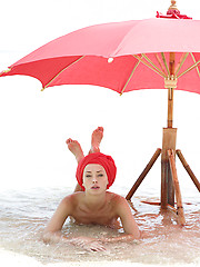 Two nude fashion models posing on the beach - Erotic and nude pussy pics at GirlSoftcore.com