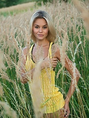 With a confident, charming allure, Taylor is a stunning sight as she strips her hot yellow dress amidst the tall, verdant grass and tree. - Erotic and nude pussy pics at GirlSoftcore.com