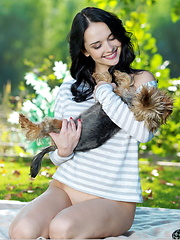 Alluring, dark brooding eyes with sultry stare, magnificent, large breasts, and lots of arousing and tempting poses, Jenya\'s seductive beauty stands out in the green vibrant background. - Erotic and nude pussy pics at GirlSoftcore.com