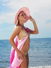 Adele posing on the wild beach - Erotic and nude pussy pics at GirlSoftcore.com