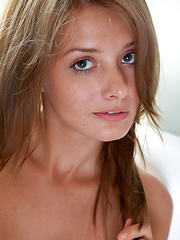 Lovely teen Edwige demonstrates her sexy natural boobs - Erotic and nude pussy pics at GirlSoftcore.com