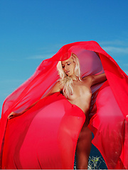 With a bright red scarf floating daintily along the wind, Adele exudes a breathtaking vision of radiant beauty and feminine gracefulness against the majestic blue sky. - Erotic and nude pussy pics at GirlSoftcore.com
