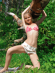 Pretty baby-faced girl - Erotic and nude pussy pics at GirlSoftcore.com