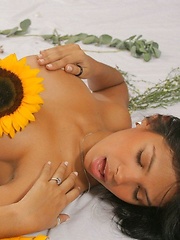 Karla Spice wears nothing but flowers over her naked body - Erotic and nude pussy pics at GirlSoftcore.com