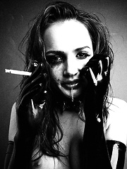 Miss Tori Black goofing off and smoking a cigarette - Erotic and nude pussy pics at GirlSoftcore.com
