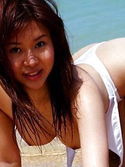 Azusa Kyouno at the beach posin big round tits - Erotic and nude pussy pics at GirlSoftcore.com
