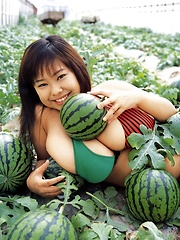 Fuko posing her watermelons tits next to real watermelons! - Erotic and nude pussy pics at GirlSoftcore.com