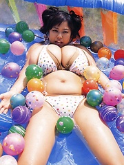 Fuko posing her watermelons tits next to real watermelons! - Erotic and nude pussy pics at GirlSoftcore.com