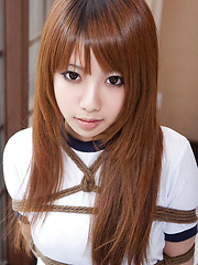 Dimdim Asian in long socks and sports outfit has hands tied - Erotic and nude pussy pics at GirlSoftcore.com