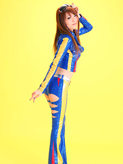 Minami Haduki Asian plays withlatex suit showing some curves - Erotic and nude pussy pics at GirlSoftcore.com