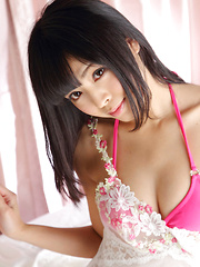 Sakura Sato Asian is playful in bed and shows big tits in bra - Erotic and nude pussy pics at GirlSoftcore.com