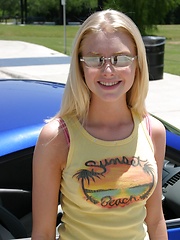 Blonde teen Skye Model shows off her tight teen body by her friends car - Erotic and nude pussy pics at GirlSoftcore.com