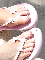 Skye loves to tease in her tiny bikini - Erotic and nude pussy pics at GirlSoftcore.com