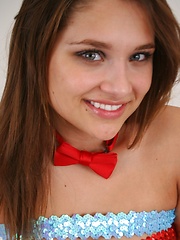 Lilis covered up with just a few belts - Erotic and nude pussy pics at GirlSoftcore.com