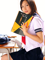 Kaori Ishii Asian is naughty and shows legs under uniform skirt - Erotic and nude pussy pics at GirlSoftcore.com
