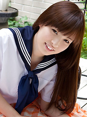 Maho Kimura Asian undresses school uniform right in the park - Erotic and nude pussy pics at GirlSoftcore.com