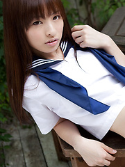 Maho Kimura Asian undresses school uniform right in the park - Erotic and nude pussy pics at GirlSoftcore.com