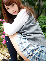 Manami Sato Asian in short uniform skirt spends time in the park - Erotic and nude pussy pics at GirlSoftcore.com