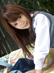 Manami Sato Asian in short uniform skirt spends time in the park - Erotic and nude pussy pics at GirlSoftcore.com