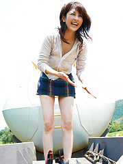 Neo Asian babe in short skirt loves playing in dangerous places - Erotic and nude pussy pics at GirlSoftcore.com