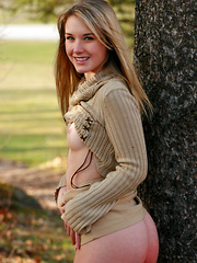 Teen beauty embraces a golden autumn outdoors naked - Erotic and nude pussy pics at GirlSoftcore.com