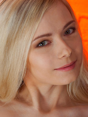 Lenore makes a sizzling hot debut as she confidently poses naked on top of the sofa, her long and slender body in full view. - Erotic and nude pussy pics at GirlSoftcore.com
