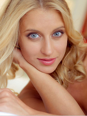 Blonde hottie Delfina A wearing an animal print chiffon robe and sheer panty that compliments her beautiful tanned body and lusty appeal. - Erotic and nude pussy pics at GirlSoftcore.com