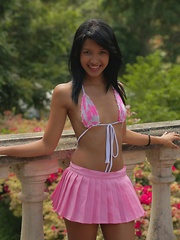 Carol Lopez wears a string bikini and a pink mini skirt and she shakes that latina teen body gives us a hot strip show - Erotic and nude pussy pics at GirlSoftcore.com