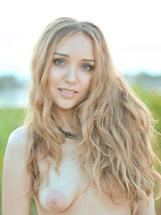 She gladly shows off her breasts when there is only the camera and you to see all her female beauty - Erotic and nude pussy pics at GirlSoftcore.com