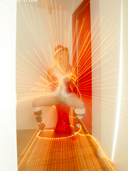 Kara in her sexy christmas outfit wrapped in lights spreading her pussy - Erotic and nude pussy pics at GirlSoftcore.com
