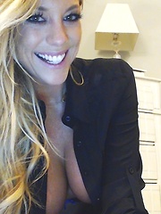 Gisele wears a sexy button up shirt with hot lingerie and black stockings as she rubs her shaved pussy