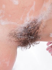 Skyler enjoys a sexy and soapy bath alone - Erotic and nude pussy pics at GirlSoftcore.com