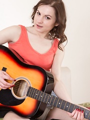 Guitar playing and sexy stripping with Whitney - Erotic and nude pussy pics at GirlSoftcore.com