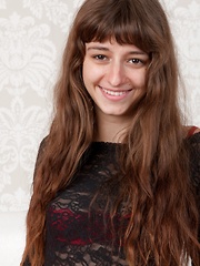 Willow wears her black dress and stockings - Erotic and nude pussy pics at GirlSoftcore.com