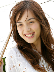 Rola Chen Asian takes clothes off under umbrella in the park - Erotic and nude pussy pics at GirlSoftcore.com